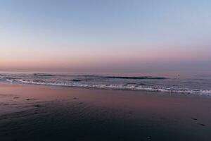 Sunrise on Santa Monica beach photo