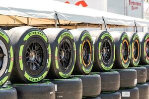 Long Beach, CA - Apr 15, 2023 - Piles of Firestone tyres at Long Beach Grand Prix photo