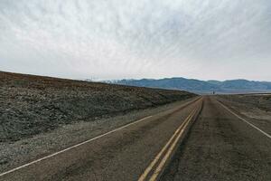 Empty American highway in the Death Valley photo