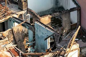 quarter of dilapidated rural houses, top view photo