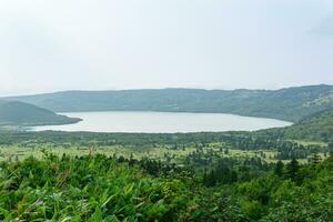 natural landscape of Kunashir island, view of the Golovnin volcano caldera with hot lakes photo