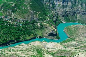 small mountain settlement on the slope of a deep canyon, the village of Old Zubutli in the valley of the Sulak River in Dagestan photo