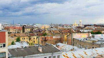 panoramic top view of the city roofs in the historical center of Saint Petersburg before the rain photo