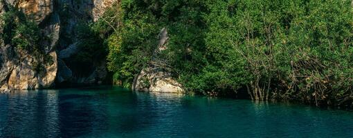 natural rocky canyon with blue water in Goynuk, Turkey photo