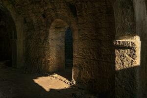 interior of a dungeon of some ancient ruins photo