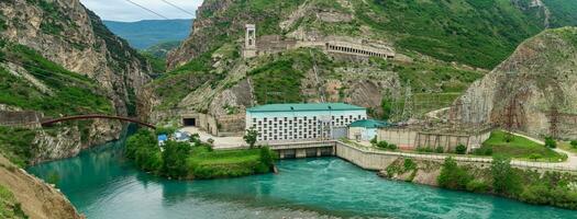 hydroelectric power plant in a mountain canyon photo