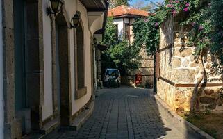 narrow winding streets of Kaleici, historical urban center of Antalya, Turkey photo