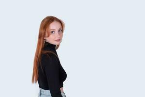 young redhead woman isolated on white background photo