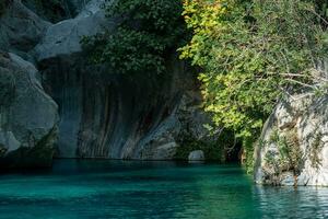 rocky canyon with blue water in Goynuk, Turkey photo