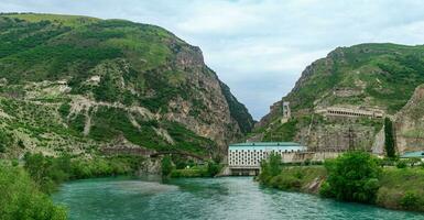 hydroelectric power plant in a mountain canyon photo