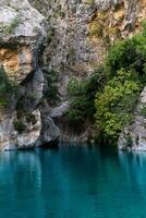 natural rocky canyon with blue water in Goynuk, Turkey photo