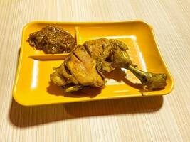 a plate of vegetables on a table photo