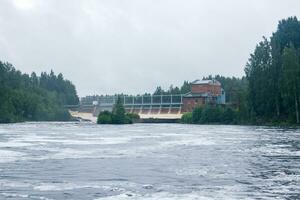 small hydroelectric power station on the northern river photo