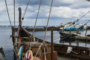 fragment of the rigging of a wooden old sailing ship close-up photo