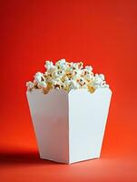 AI generated blank pop corn box mockup in plain red isolated background photo