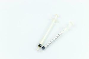 Syringe isolated on white background with clipping path. Close up. photo