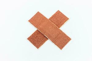 Medical adhesive bandage isolated on white background, clipping path included. photo