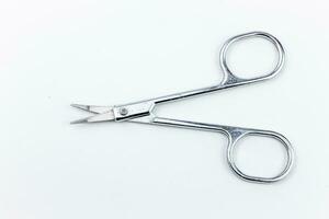 Manicure scissors isolated on white background, clipping path included. photo