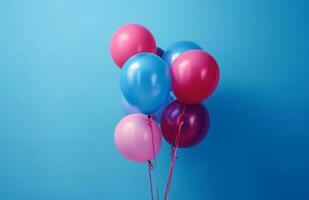 ai generado grupo de vistoso globos en un azul antecedentes fiesta foto