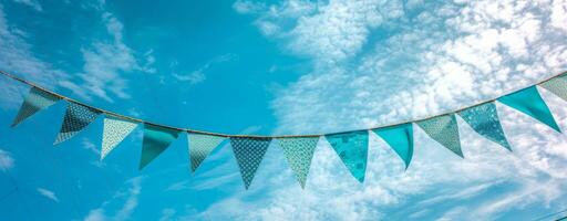 AI generated coloured bunting against the blue sky photo