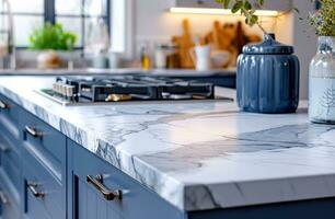 AI generated the marble counter top and blue colored cabinets in the kitchen photo