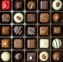 AI generated a box with chocolates arranged in a single row, mind-bending patterns photo