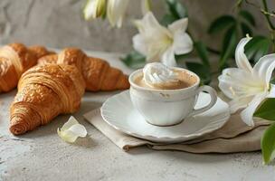 AI generated an image of a white tea cup, croissants, flowers and coffee photo