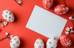 ai generado un blanco sábana de papel con rojo y blanco Pascua de Resurrección huevos y blanco tarjeta en un rojo fondo, naranja foto