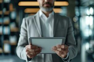 AI generated businessman holding a tablet computer in the office photo