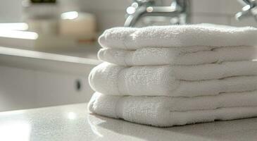 AI generated a stack of white towels on the counter photo
