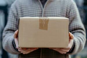 AI generated delivery company business man holds cardboard box photo