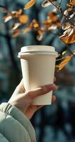 AI generated person hand holding cup of coffeewhite disposable paper cup photo