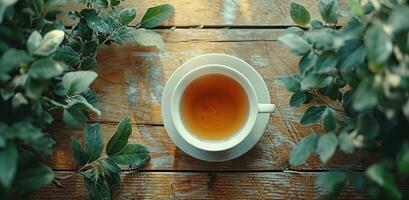 ai generado un taza de té se sienta en el mesa siguiente a otro objetos foto