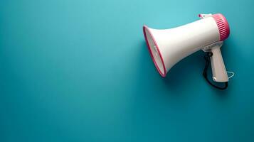 AI generated Megaphone or hand speaker isolated on blue background with copy space photo