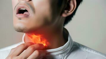 AI generated Flame at neck of a man. Concept of sore throat, pharyngitis, laryngitis, thyroiditis, choking photo