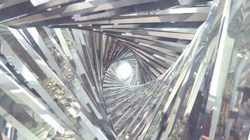 Abstract metallic shiny silver chrome polyhedral tunnel frame made of lines of hexagonal edges, mechanical high-tech tunnel futuristic, abstract background video