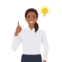 Happy business woman pointing hand up and bright light bulb appearing in the thought bubble. Idea and innovation concept. Flat vector illustration isolated on white background