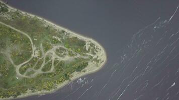 Top view of the Cape on the lake. Clip. Stunning lake and foreland view from mount photo