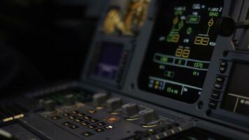 Autopilot control element of an airliner. Panel of switches on an aircraft flight deck. Thrust levers of a twin engined airliner. Pilot controls the aircraft. Onboard computer, cockpit photo