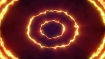 Abstract background looped circles a tunnel of flying yellow fire rings of energy plasma with a glow effect shiny festive bright beautiful futuristic hi-tech, screensaver, video in high quality 4k