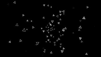 Computer generated abstract space. Animation. Abstract background of numerous white triangles floating chaotically on a black. photo