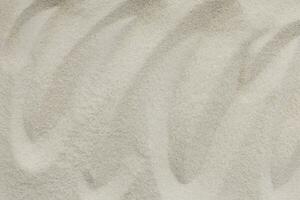 Unique beach sand textures are perfect for enhancing graphic design projects photo