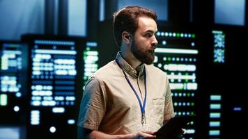 Engineer doing maintenance in server room providing secure, scalable, and reliable infrastructure for storing, processing, and analyzing large amounts of data generated by AI applications photo