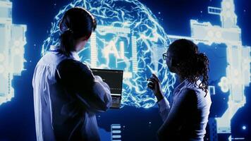 Coworkers deploying lines of code for artificial intelligence computerized model simulating human brain. Colleagues overseeing AI visualization showing machine learning algorithms pattern recognition photo