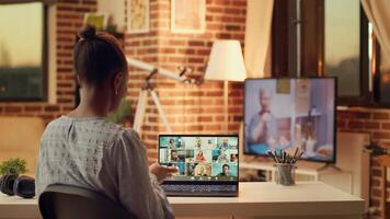 Person attends videocall with people online, discussing about important freelancing tasks to finish in time. Woman meeting with contractor on telework call, remote job at home. photo