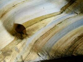 Beautiful rainbow cave in Chiang Mai province, Thailand, texture of cave wall image, cave features a natural marble color pattern on its walls photo