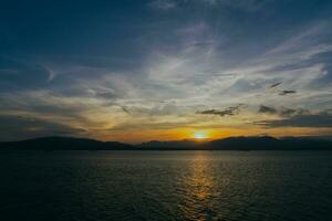 Sunrise sky on Bali Strait. photo