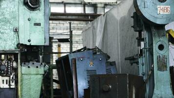 Close up for woodworking factory machines. Metal machine tools looking old at a workshop, factory concept. photo