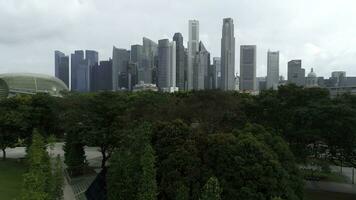 Singapore, June 17, 2018. Aerial footage of Singapore skyscrapers with City Skyline during cloudy summer day. Shot. Aerial view of Singapore city photo