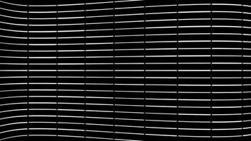 Abstract animation of moving waves from grey and white short neon stripes on black background. Animation. Animation of seamless loop, thick stripes flying. photo